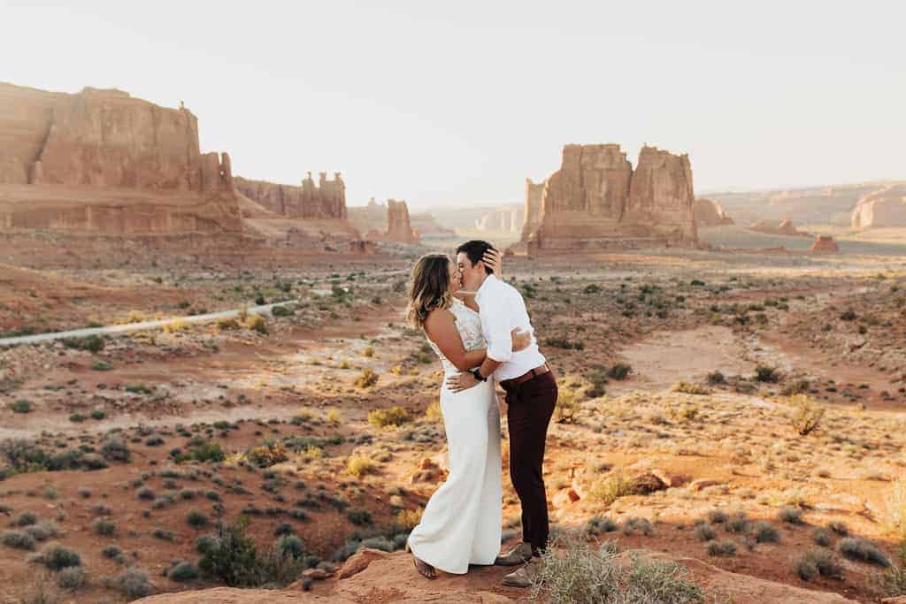 Couple's portraits after the ceremony in Arches National Park | Under Canvas Elopement in Arches National Park | Nicole Aston Photography | Zion Brides Feature