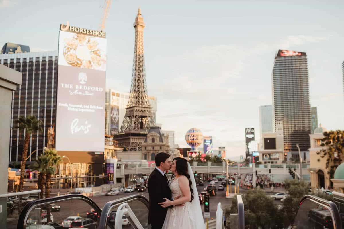 Bride and groom explore the Vegas Strip together after their elopement ceremony | Vegas Elopement in the City and Desert | Amber Garrett Photography | Adventure Wed Feature