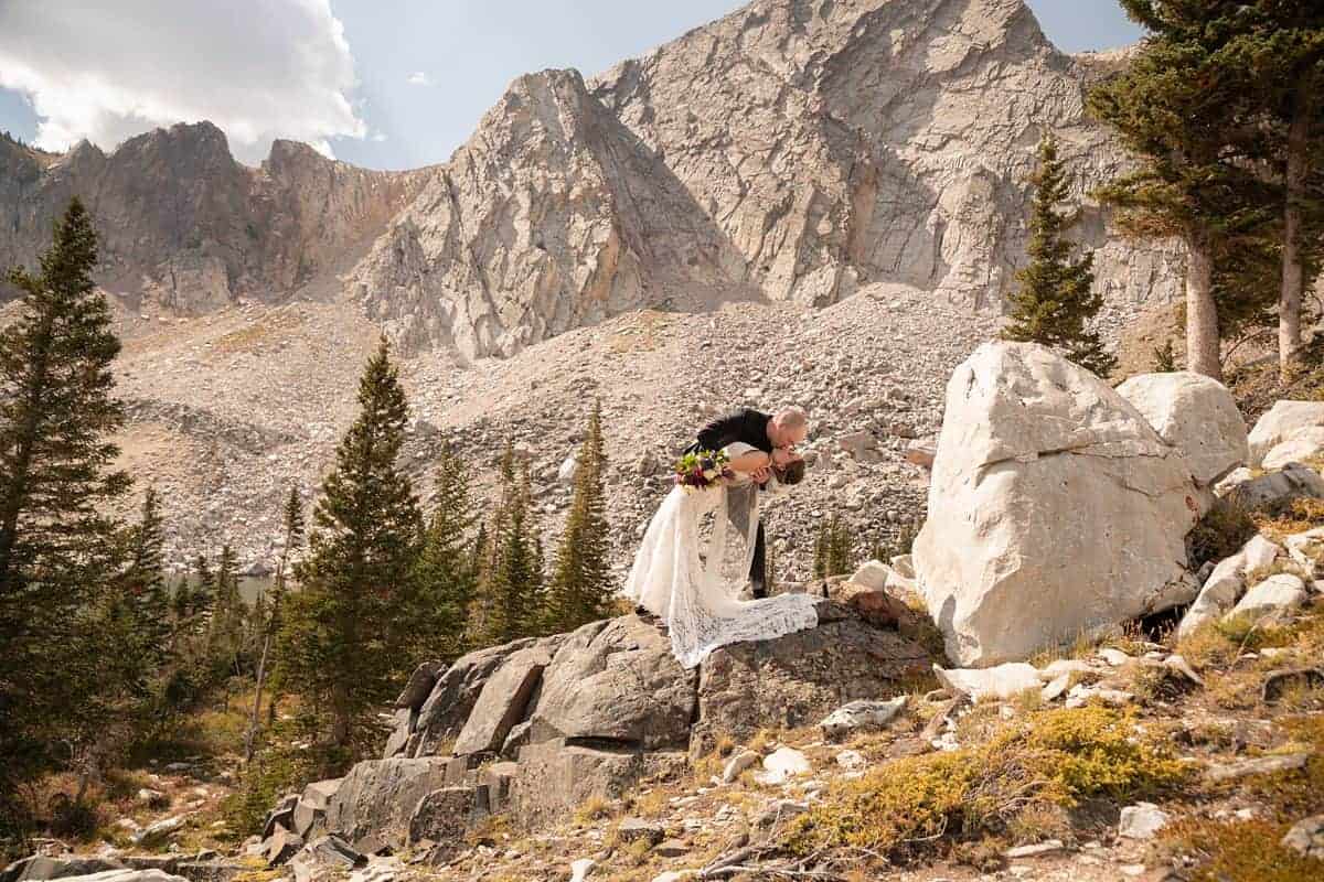 Bride and groom share vows and moments in Medicine Bow National Forest | Summer Laramie, Wyoming Outdoor Wedding | Hearts and Horizons Media | Adventure Wed Feature